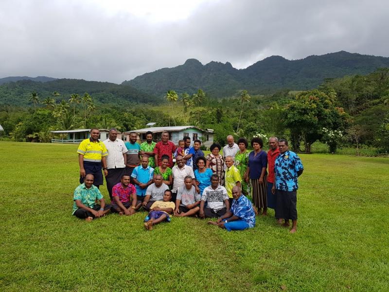 Villages of the 6 districts of Wairiki pose for a group photo.jpg