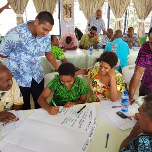 Community representatives from Ba's Watershed region participate in group discussions.jpg