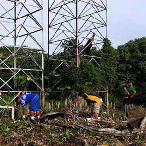 Youth clean around a water supply and reservoir station at Hihifo. 21 November 2020.
